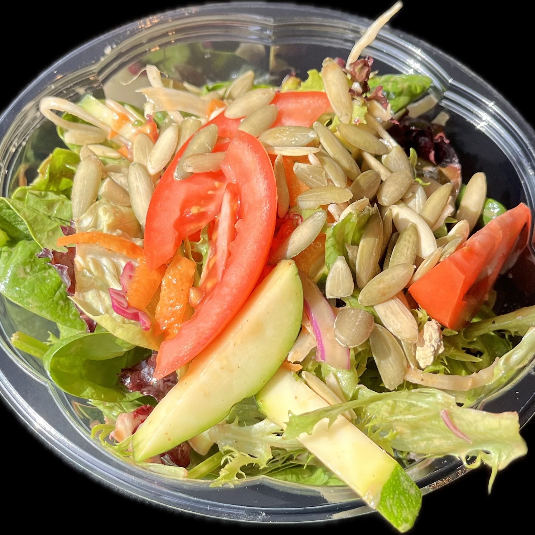 Greens and Cabbage, Mixed Greens, Cabbage, Garbanzos, Carrots, Zucchini, Tomatoes, Pomegranate Dressing, Pepitas.