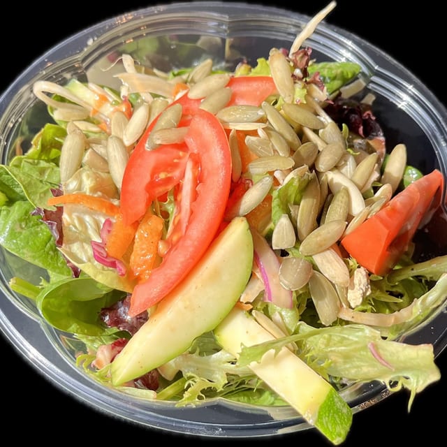 Greens and Cabbage, Mixed Greens, Cabbage, Garbanzos, Carrots, Zucchini, Tomatoes, Pomegranate Dressing, Pepitas.