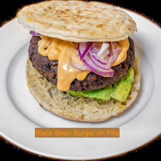 Black Bean Falafel Burger Avocado Hummus, Chipotle Mayonnaise & Pickled Onions (V)