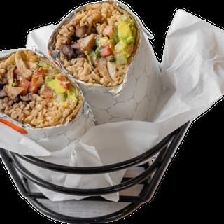 Grilled Chicken Shawarma Burrito, Mexican Brown Rice, Black Beans, Avocado Hummus, Israeli Salad, Tahini