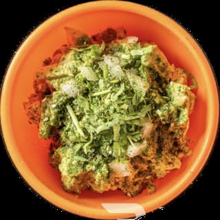 Chunky Avocado Hummus, Our Guacamole, Cilantro, Onions, Zatar, Zhoug sauce, Pita chips
