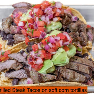 Carne Asada Tacos, 2 Corn Tortillas, Mexican Brown Rice, Black Beans, Pico de Gallo, Avocado Hummus